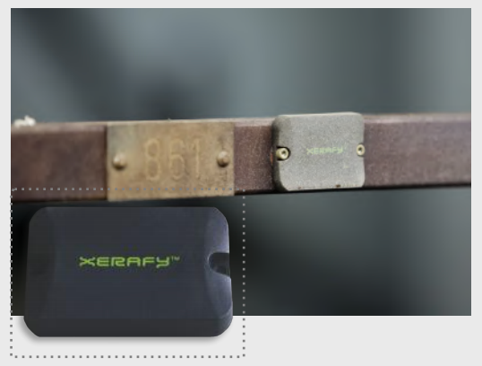 Xerafy Micro X-II RFID tag mounted on product hangers at Rittal's paint shop