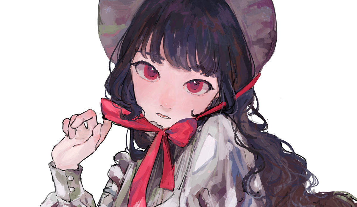 赤いリボンのヘッドドレスを身につけこちらを見つめる女の子