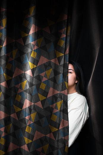 Girl Behind a Curtain