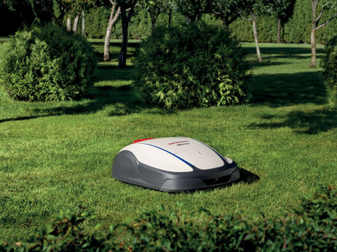 A Honda Miimo mowing the lawn