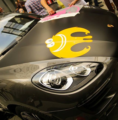 Porsche_auto_autofolierung_KFZ_Fahrzeugbeschriftungen_Folienplott_Event_Carshow