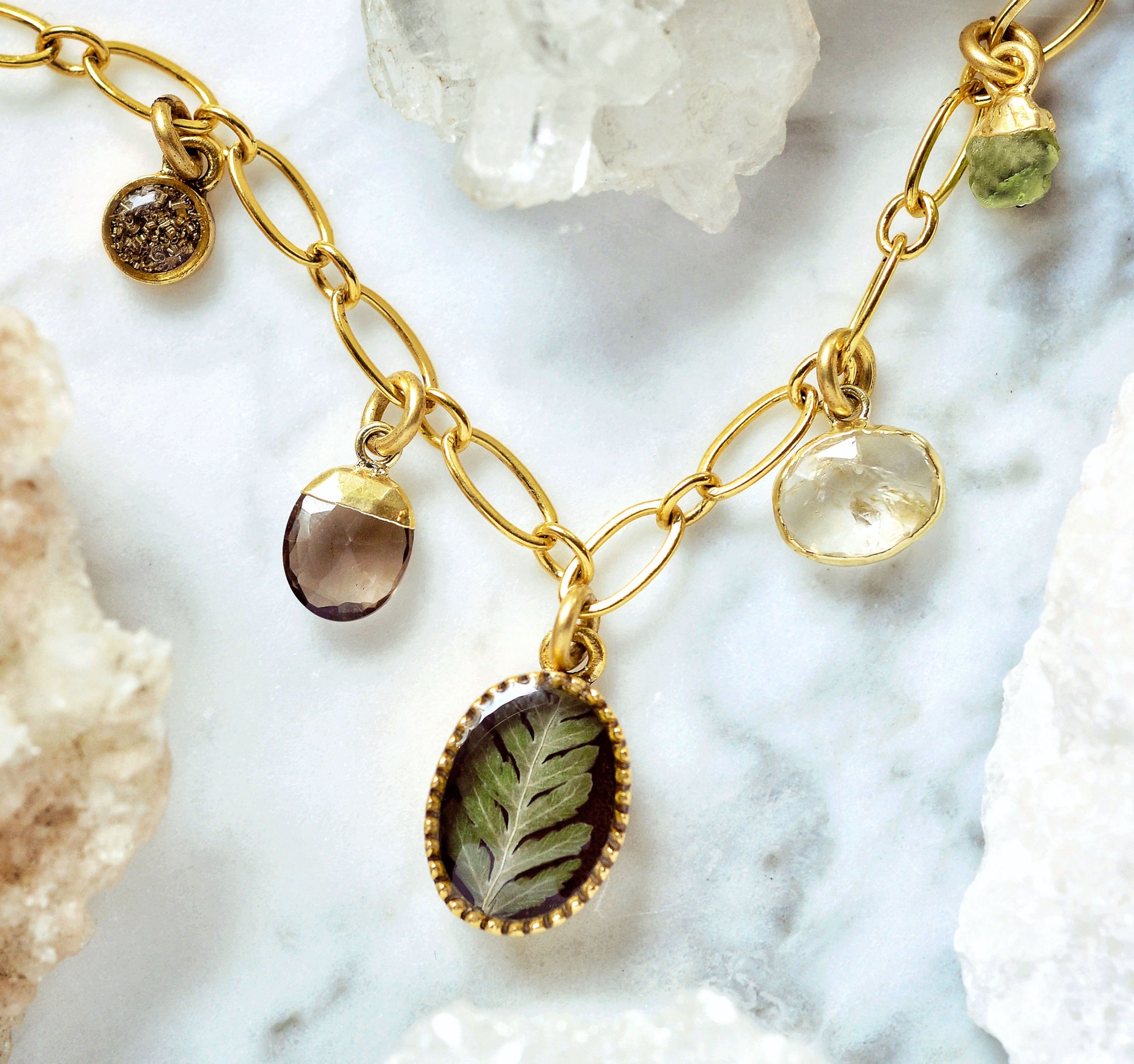 Charm necklace with Fern, Gems, and crushed stone accent