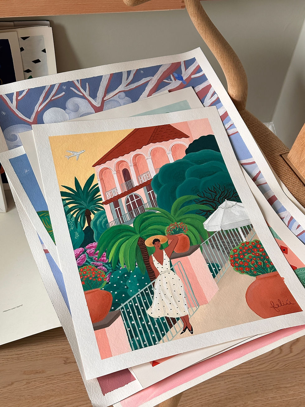 'Reid's hotel' laying flat on chair