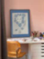 Framed art print of a portrait surrounded by a bouquet of flowers, symbolizing inner harmony, beauty, and playfulness.
