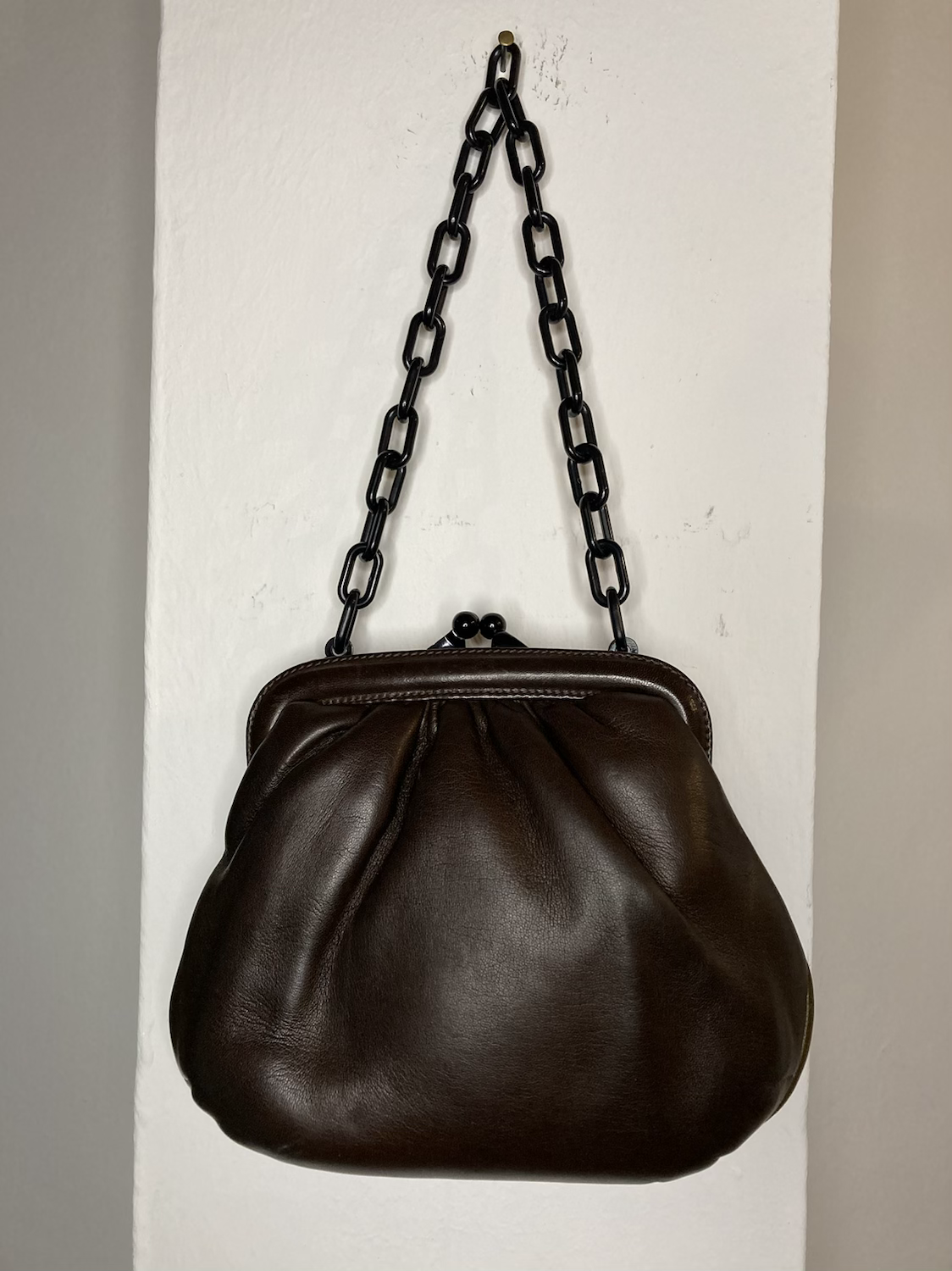 LEATHER AND BAKELITE CLUTCH