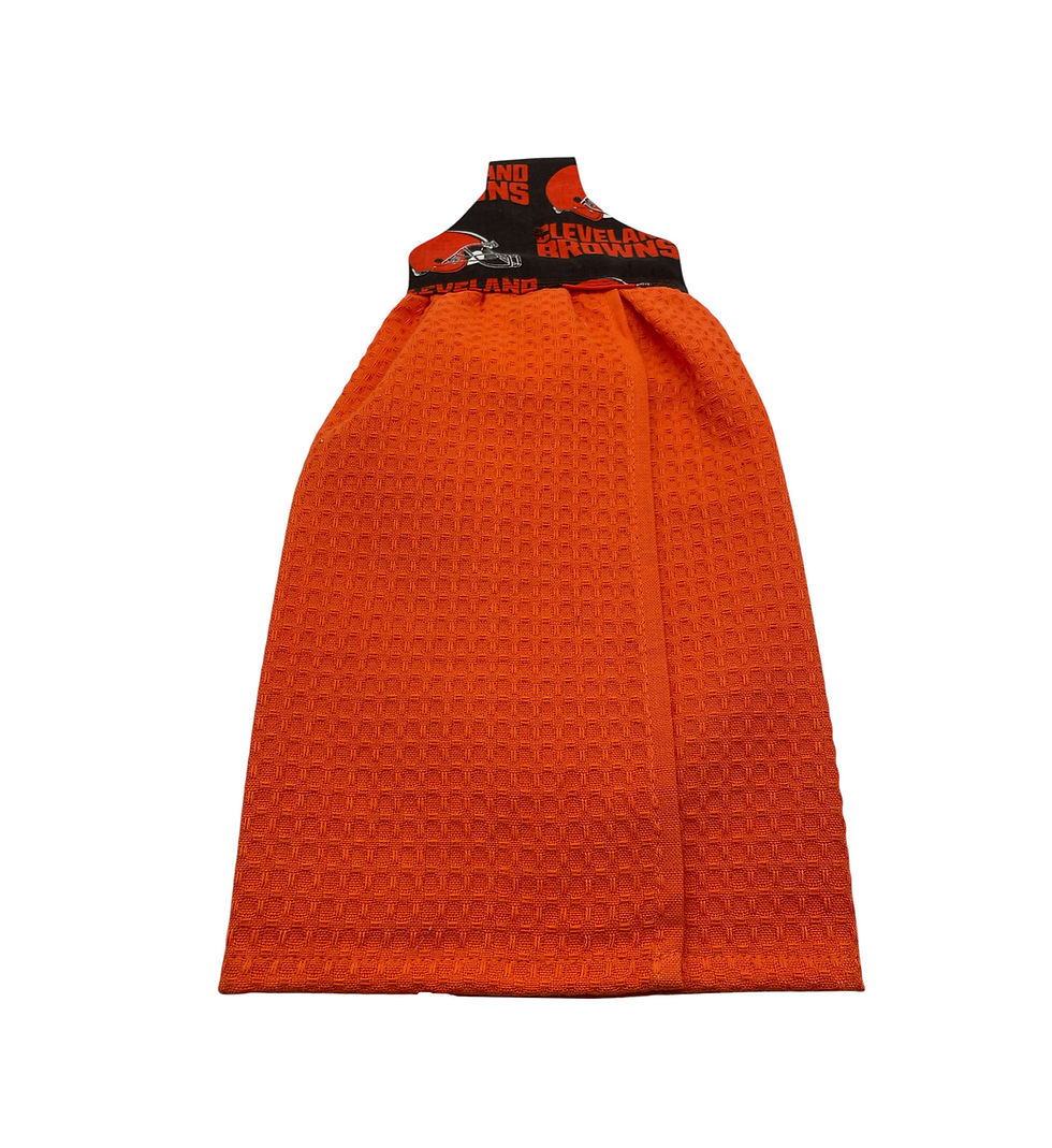 Thumbnail: Orange waffle weave kitchen towel with black accents hanging against white background.