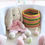 Thumbnail: Crochet Easter Basket Handmade Pink, Yellow, Green Soft Washable With Handles pink easter bunny with pink background