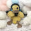 Thumbnail: Adorable crocheted duck wearing a hat