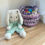 Thumbnail: Infant Crochet Easter Basket Handmade Light Dark Purple Soft Cloth With Handles with white background wood floor and crochet easter bunny in mint color
