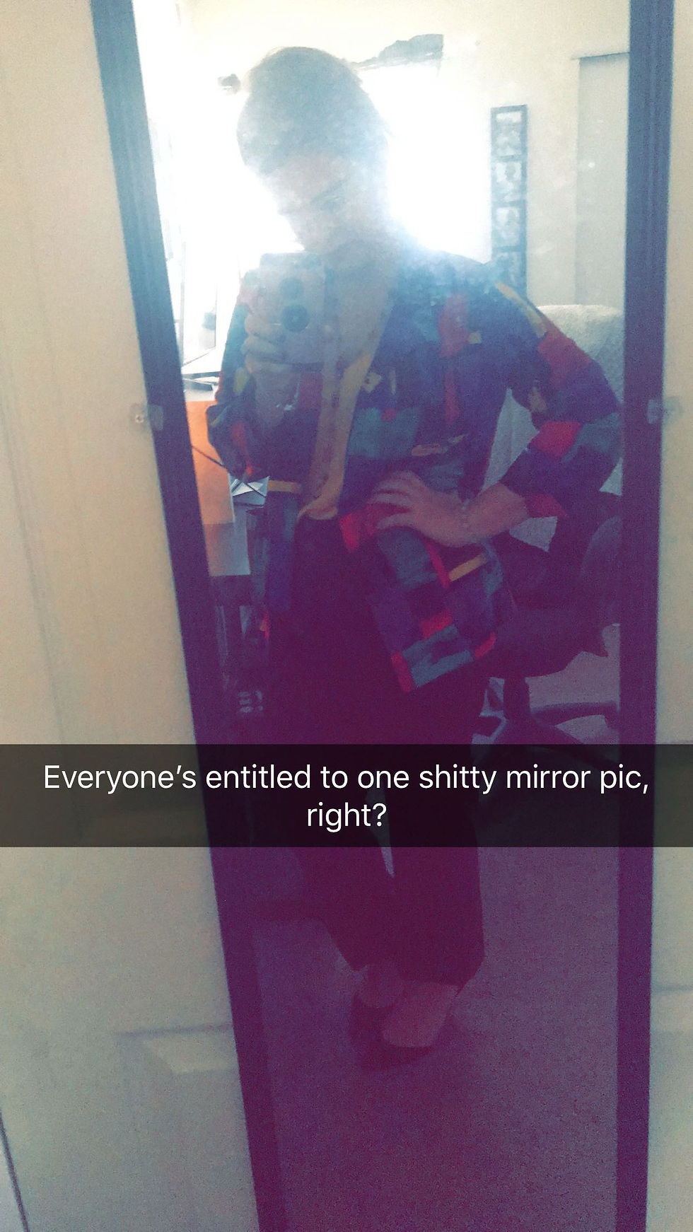 Emily wearing a thrifted oversized blazer and DIY bell-bottom pants before her boutique job interview in 2017—the outfit that sparked her styling journey.