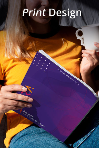 Person holding a purple notebook, representing print design services like brochures, flyers, and banners.