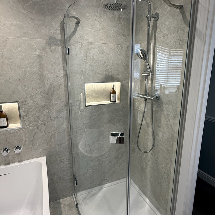 grey tiles corner shower