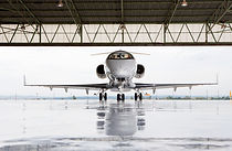 Pilots in private jet in hangar.jpg