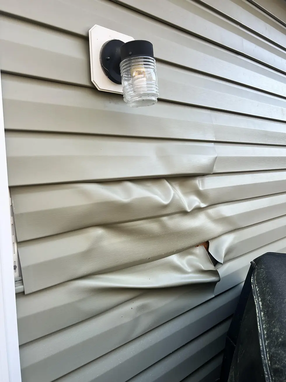 Grill heat warped vinyl siding