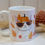 Thumbnail: Cat with Glasses and Hat Design: Ceramic 11oz Mug and Square Drinks Coaster Set