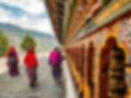 The red robed monks whirling the prayer wheels at Changangkha Lhakhang, Thimphu_The Bhutan Odyssey_Places to visit in Bhutan
