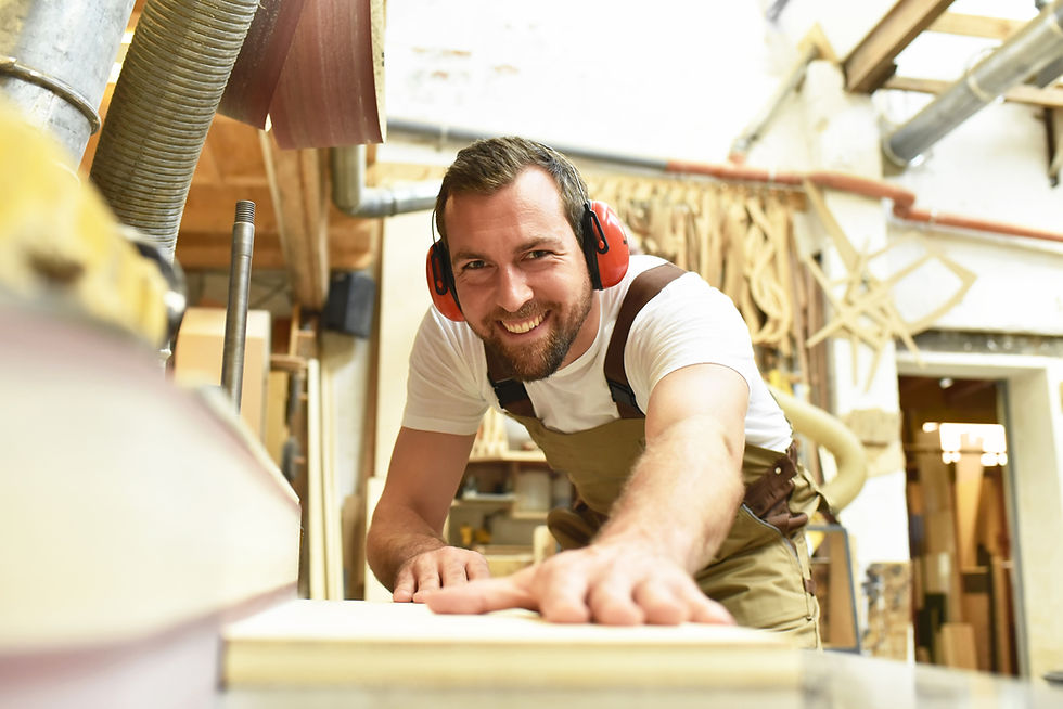 carpenter in a workshop woodworking