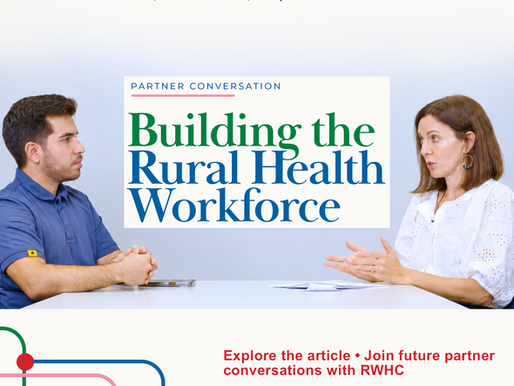 Two People seated across from one another in a discussion