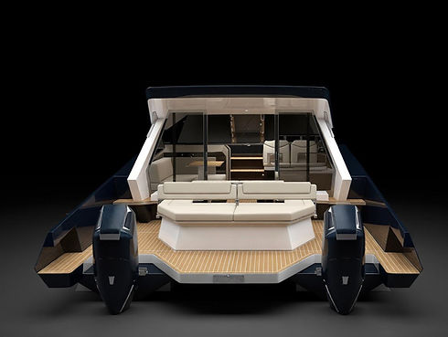 Vista da poppa del DL38 powercat in alluminio con doppio motore fuoribordo, grande pozzetto, divano centrale e accesso diretto al mare