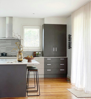 Beautiful sheer curtains in kitchen & plantation shutters