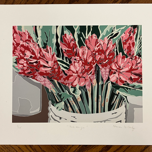 Vibrant floral print with red flowers in a basket-style vase, artwork.