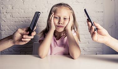hands of internet and network addict mother and father using mobile phone neglecting littl