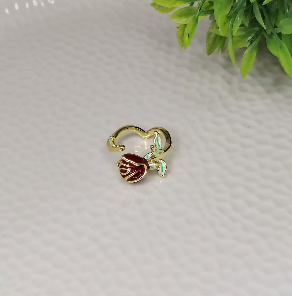 Gold Rose Ring with red enamel flower and green leaves.