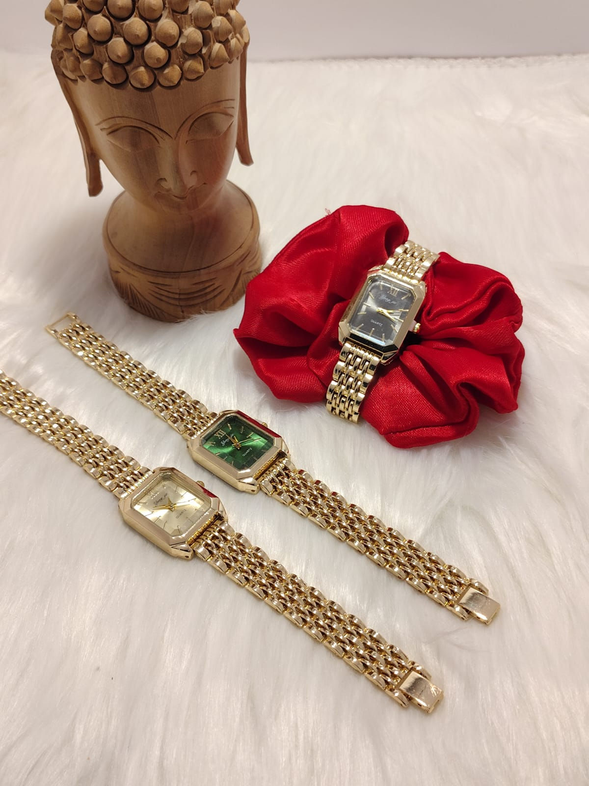 Gold rectangle dial watches with green, white, and black faces