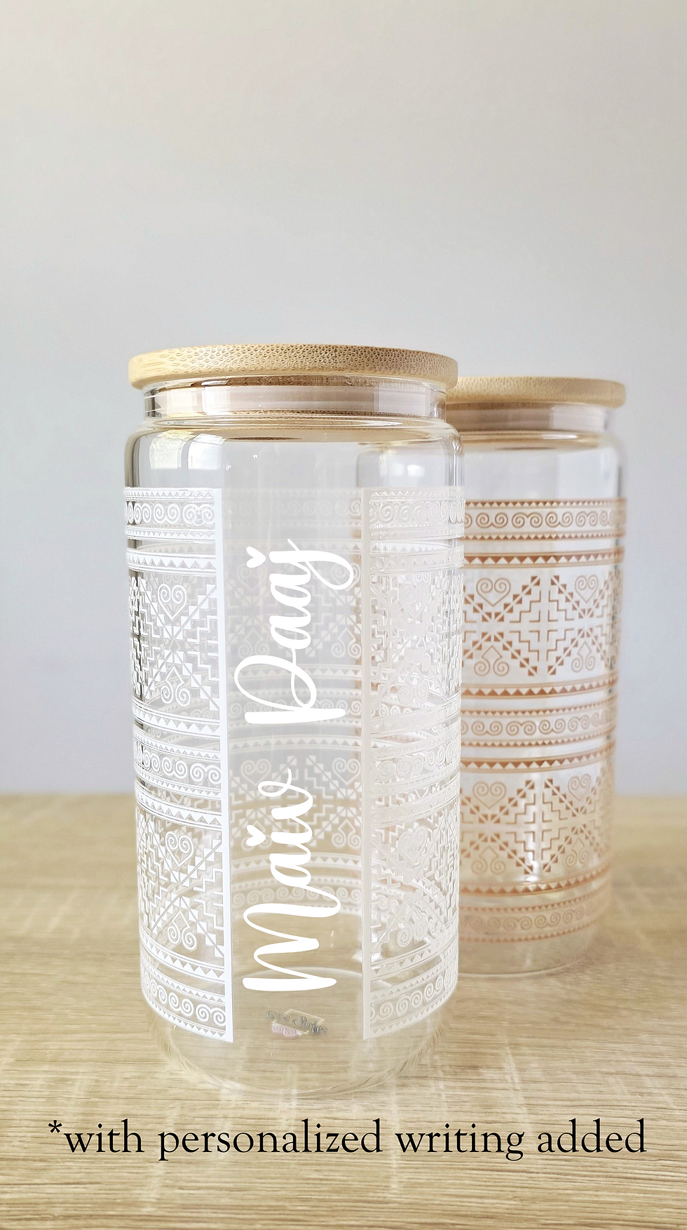 white and tan keng hmong glass tumler cups with personalized writing