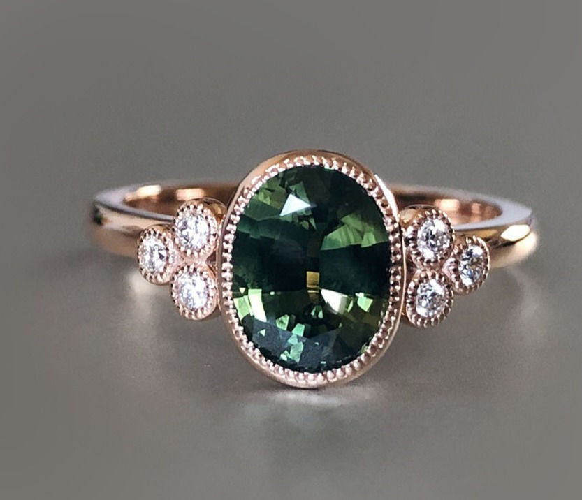 Green sapphire and diamond ring