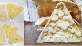 More popped triangle Corn chips