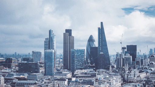 Modern skyscrapers in London’s financial district symbolizing global markets and international economic growth.