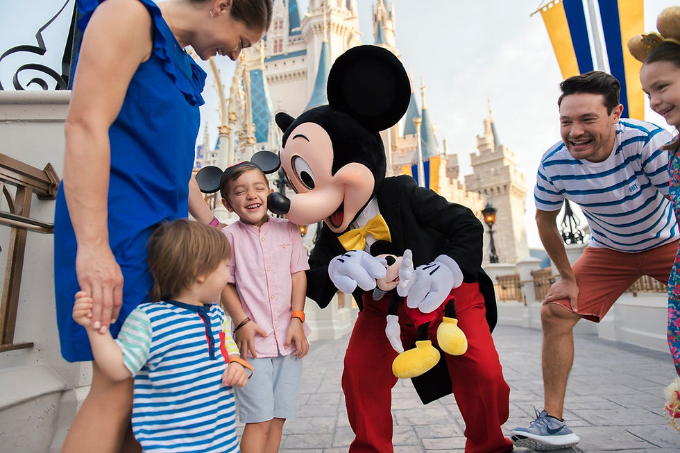 Mickey Mouse at Magic Kingdom making kids laugh