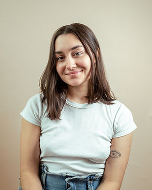Zoe Novello's headshot, smiling