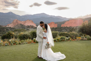 bride and groom portrait in front of garden of the gods