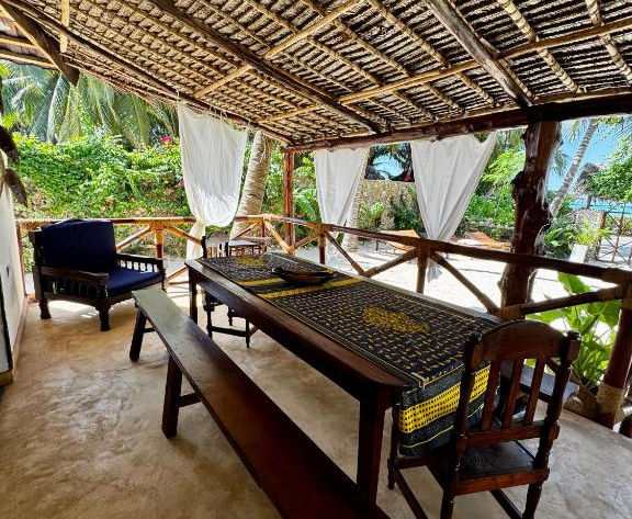 Beachfront Villa in Pwani Mchangani for sale - table outside