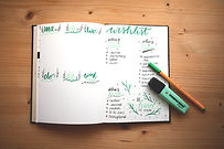 open notebook on brown wooden surface_ed