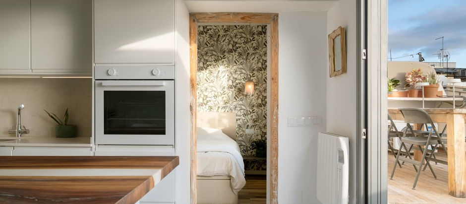 Close-up of the kitchen and bedroom in an apartment with access to a terrace