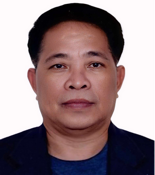 A headshot of a man wearing a dark blazer and a blue shirt against a white background.