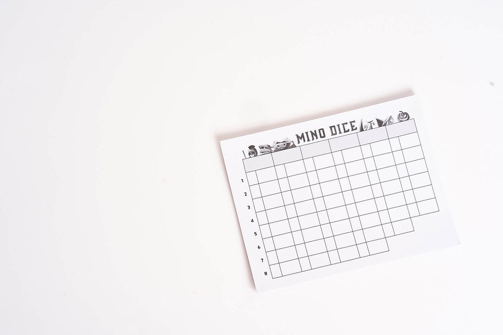 A sheet with the words "Mino Dice" printed at the top and a grid below.