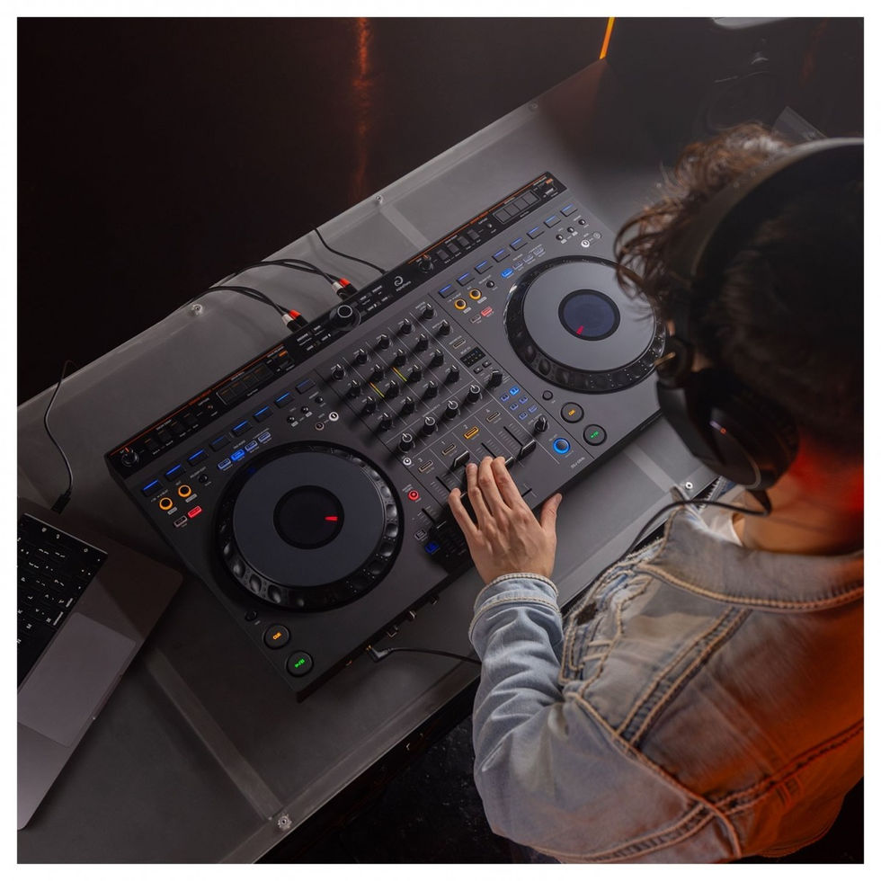 Image of AlphaTheta DDJ-GRV6 4-Channel DJ Controller top view of DJ using the unit