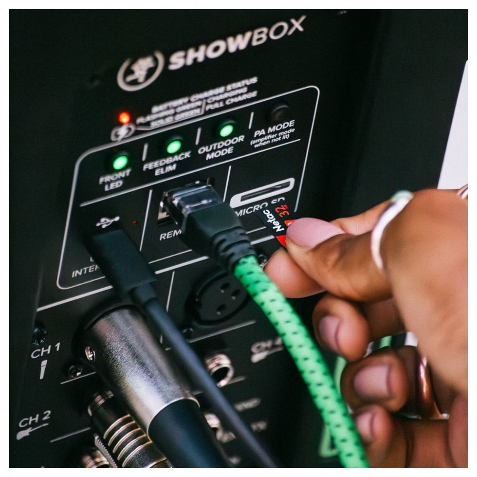 Image of Mackie Showbox 8" Battery-Powered PA Speaker back view with hand