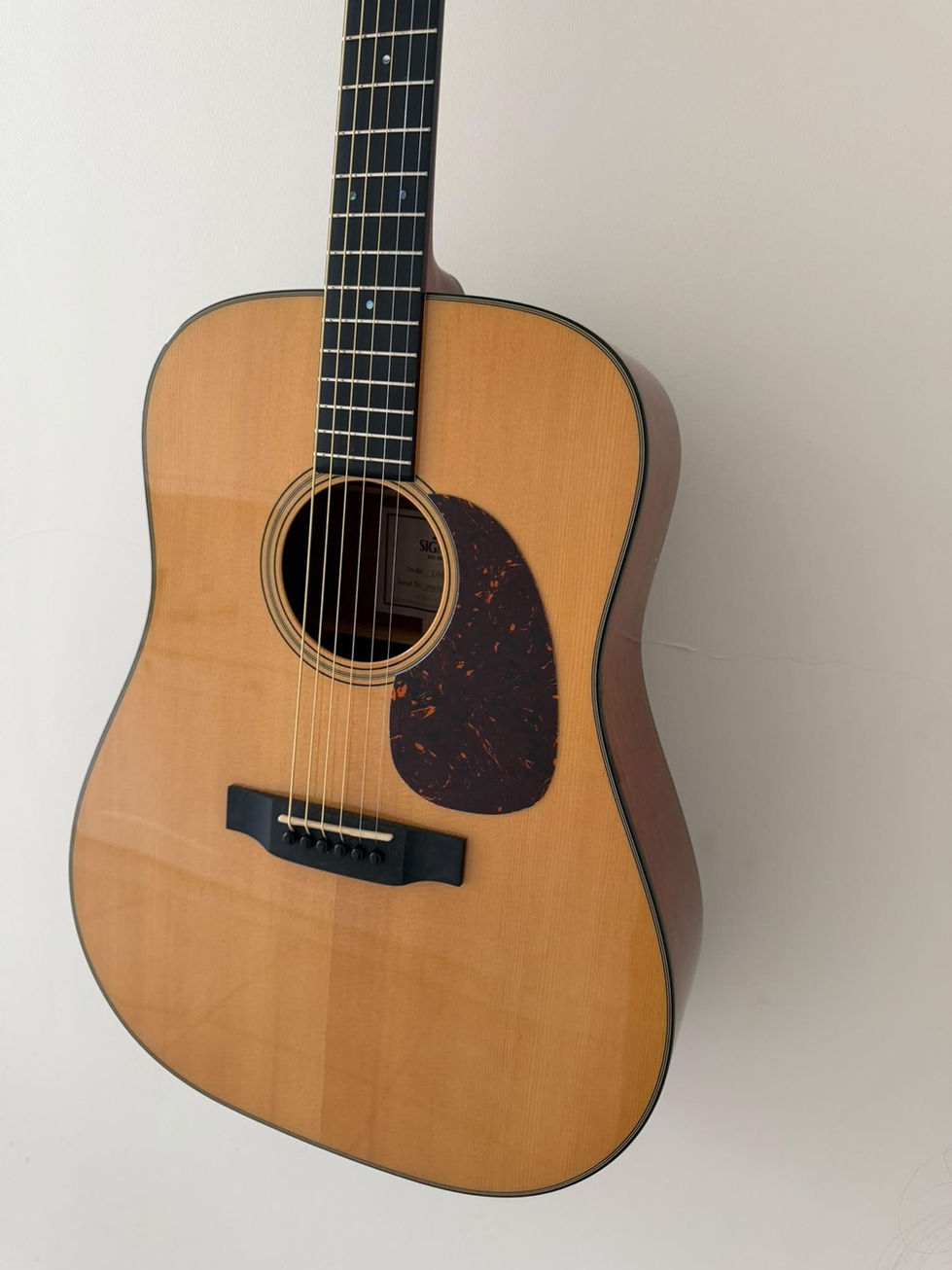 Front view of Sigma DM-18 Acoustic Guitar - Natural - Secondhand body detail