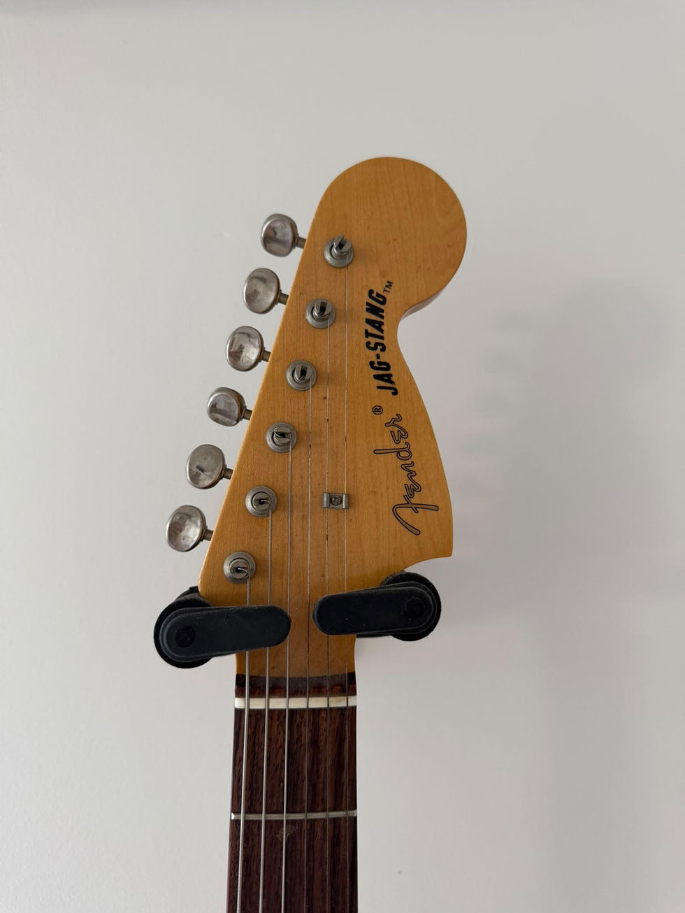 Front view of Fender Kurt Cobain Jag-Stang - Fiesta Red headstock