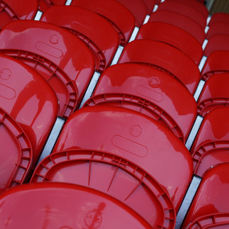 Detail view of Link Mirage stadium seating showing the seat design and finish