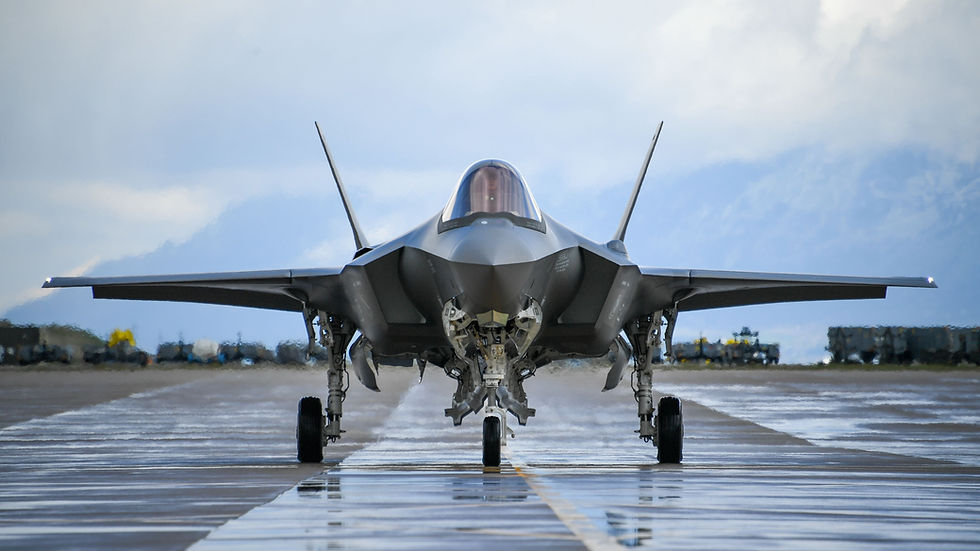 a military jet is on the runway