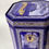 Thumbnail: Ringtons Tea merchants tea caddy or biscuit tin in blue and white with gold details, celebrating 100 years of business