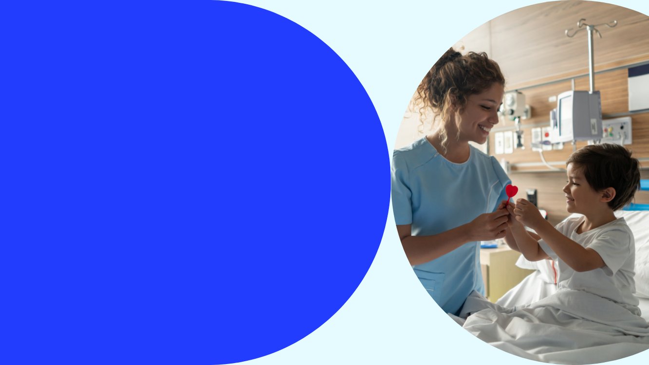 Nurse giving a heart-shaped lollipop to a child in Pediatric Care