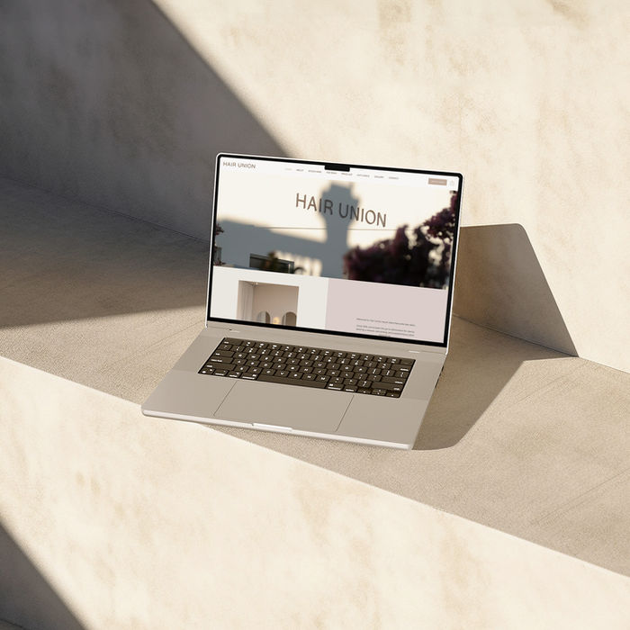 Custom business website design displayed on laptop