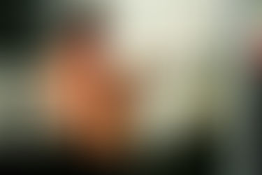 Denver personal trainer doing bicep curls at a gym in Boulder Colorado